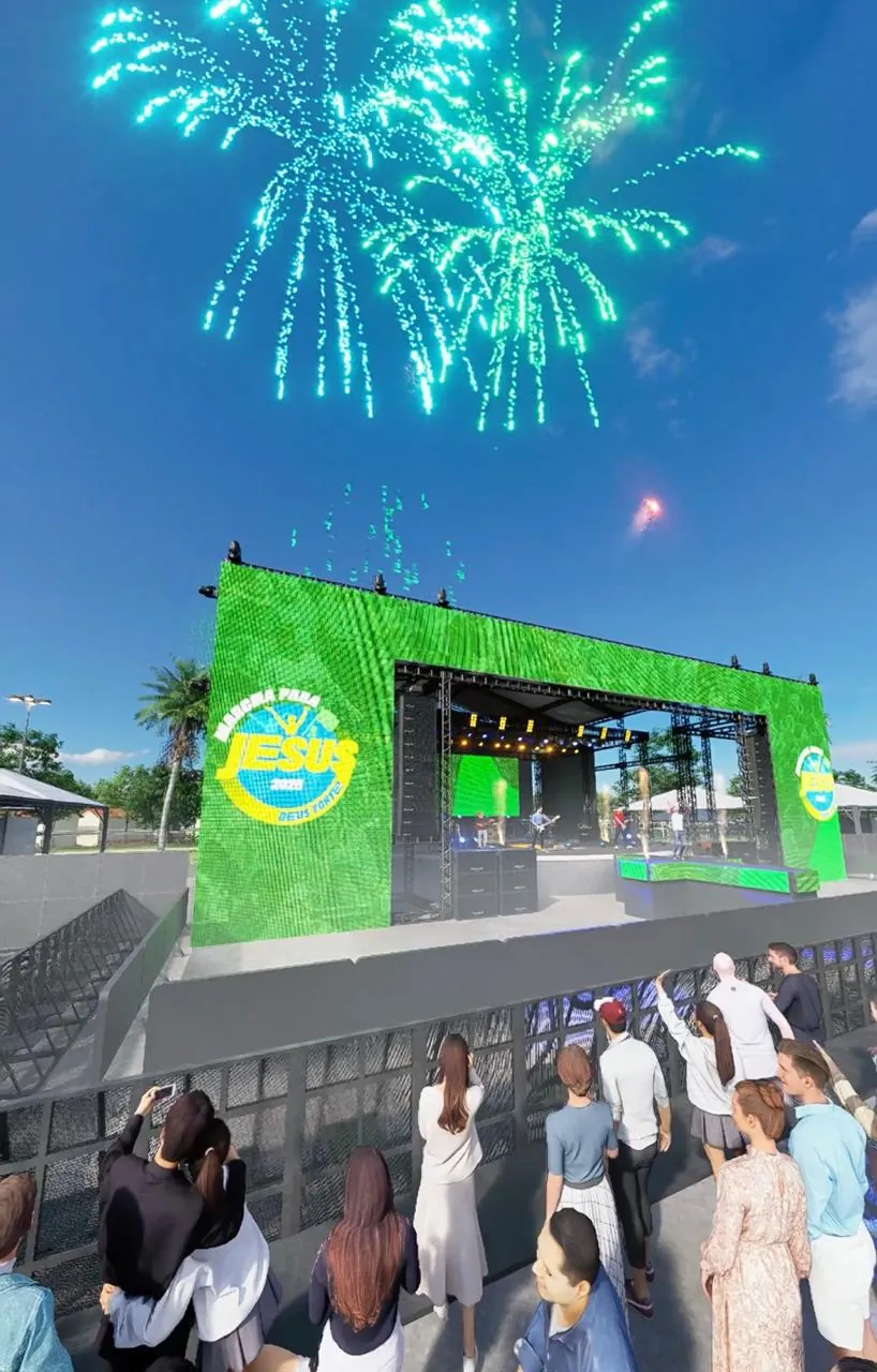 Palco verde com fogos de artifício e público